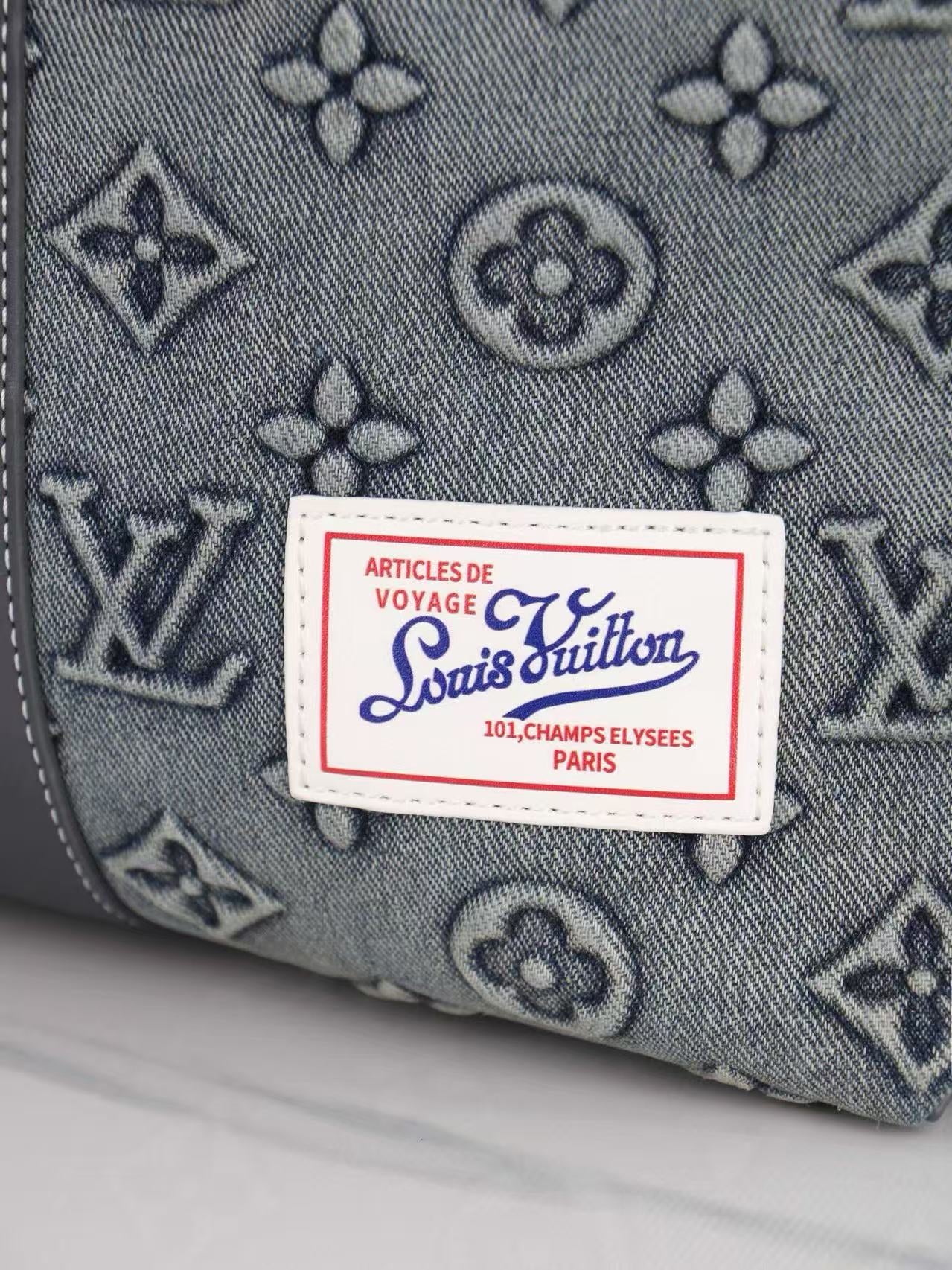 Denim Embossed Travel Bag